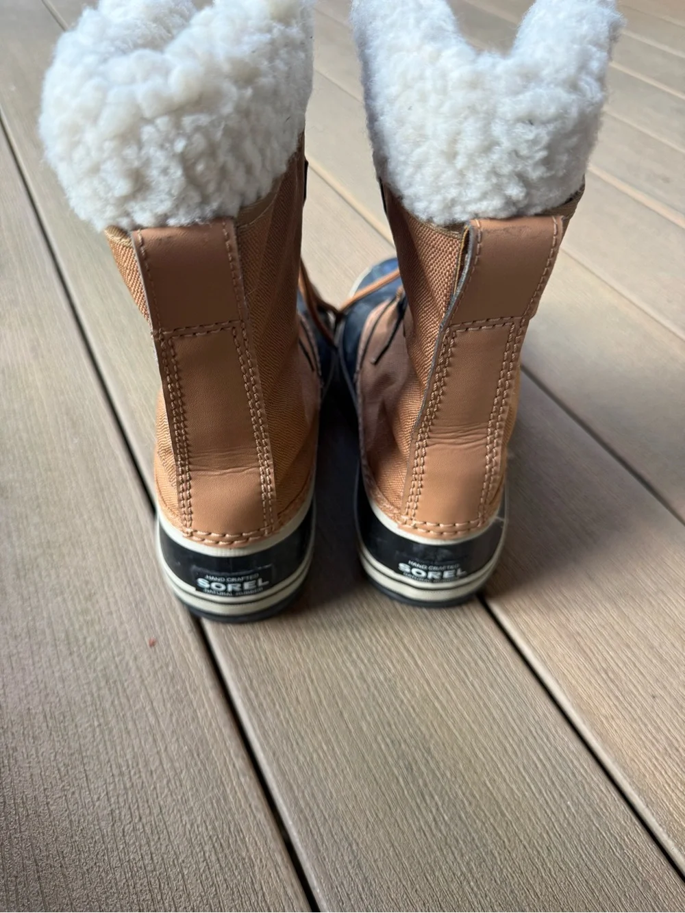 SOREL Insulated Lace-Up Duck Boots in Black and Brown